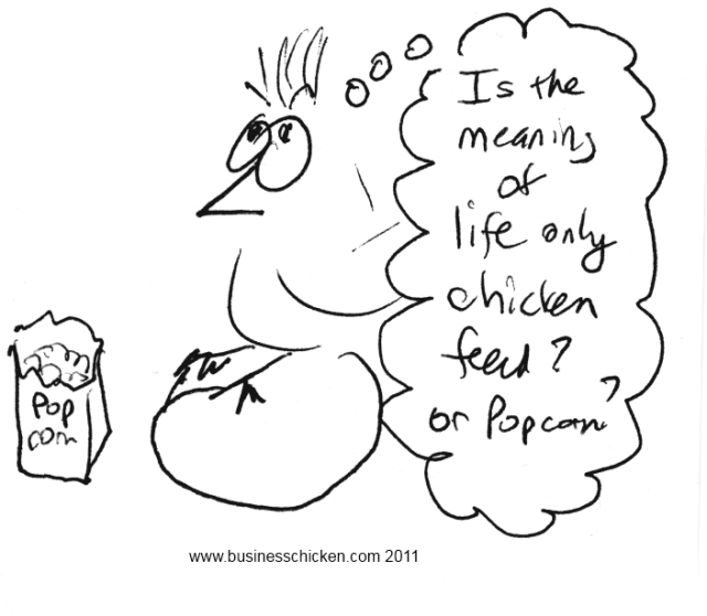 chicken pondering with bag of popcorn